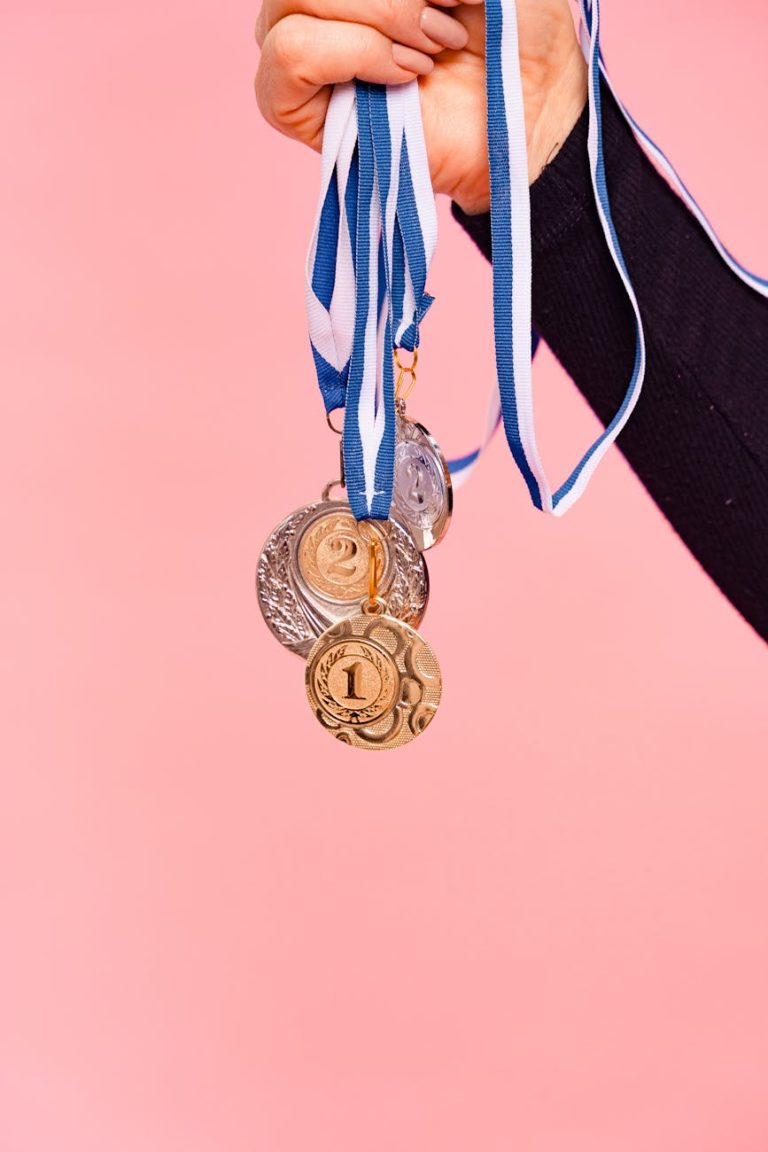 a person holding medals